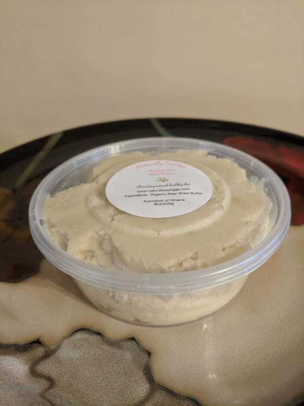 plastic container of raw organic shea butter