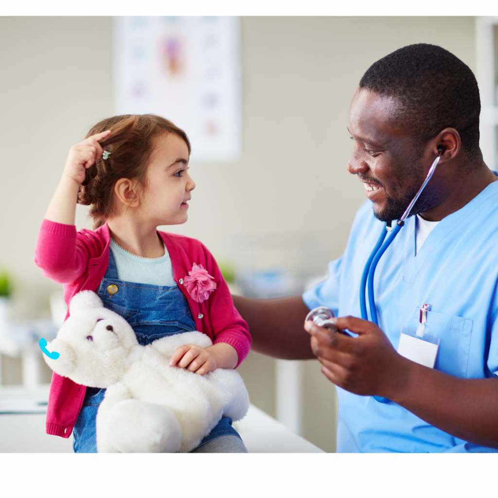 doctor examining little girl in the doctor's office